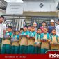 Foto bareng santri TPQ. El-Fath usai pemberian santunan sarung di Hari Santri Nasional 2025 oleh PWRI Kabupaten Sumenep (Foto: Rez Indeks Jatim)